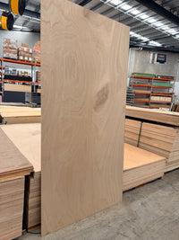 Marine Plywood standing up in a plywood warehouse