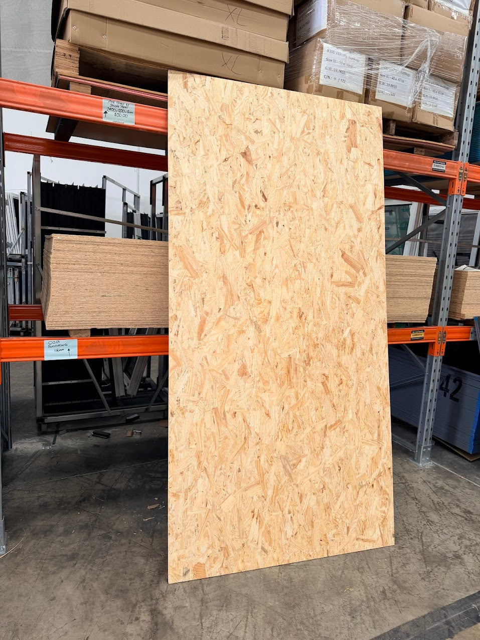 OSB Sheeting leaning up against a shelf