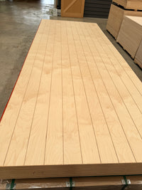 Stack of V-groove plywood sheets ready for Melbourne delivery