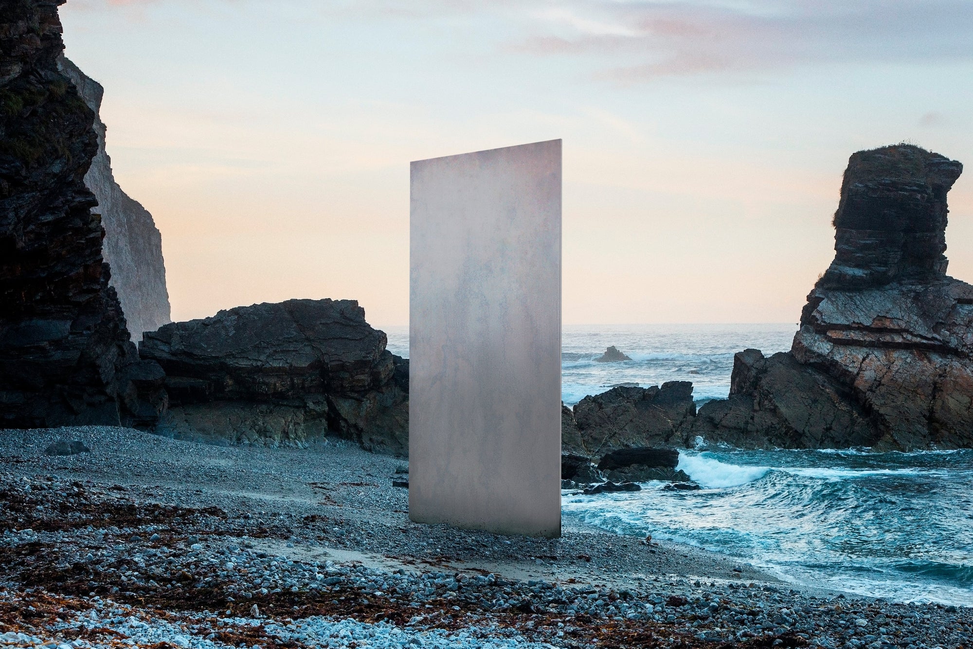 Innova Earthstone Patina Grey fibre cement facade panel - official hero image, coastal setting