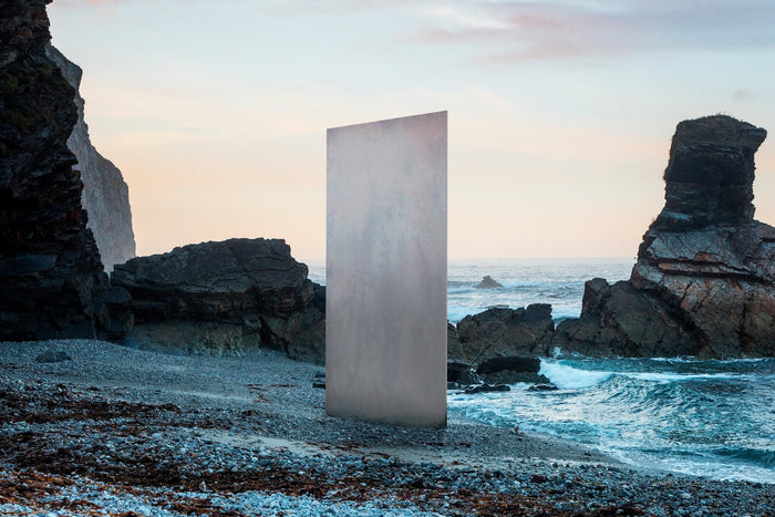 Innova Earthstone Patina Grey fibre cement facade panel - official hero image, coastal setting