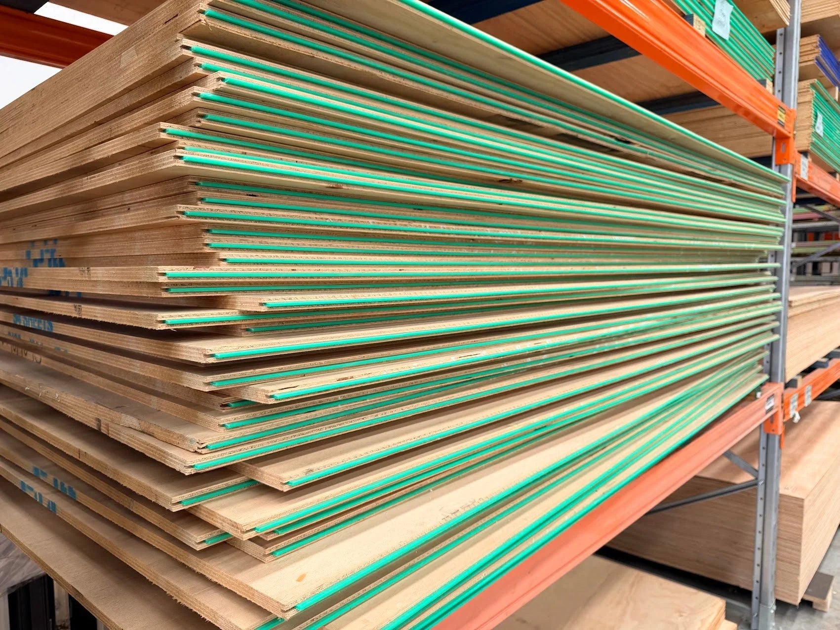 Tongue and groove plywood flooring sheet with interlocking edge profile