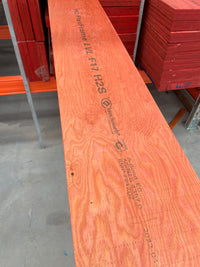 Full-length H2S LVL F17 structural beam laid on warehouse racking