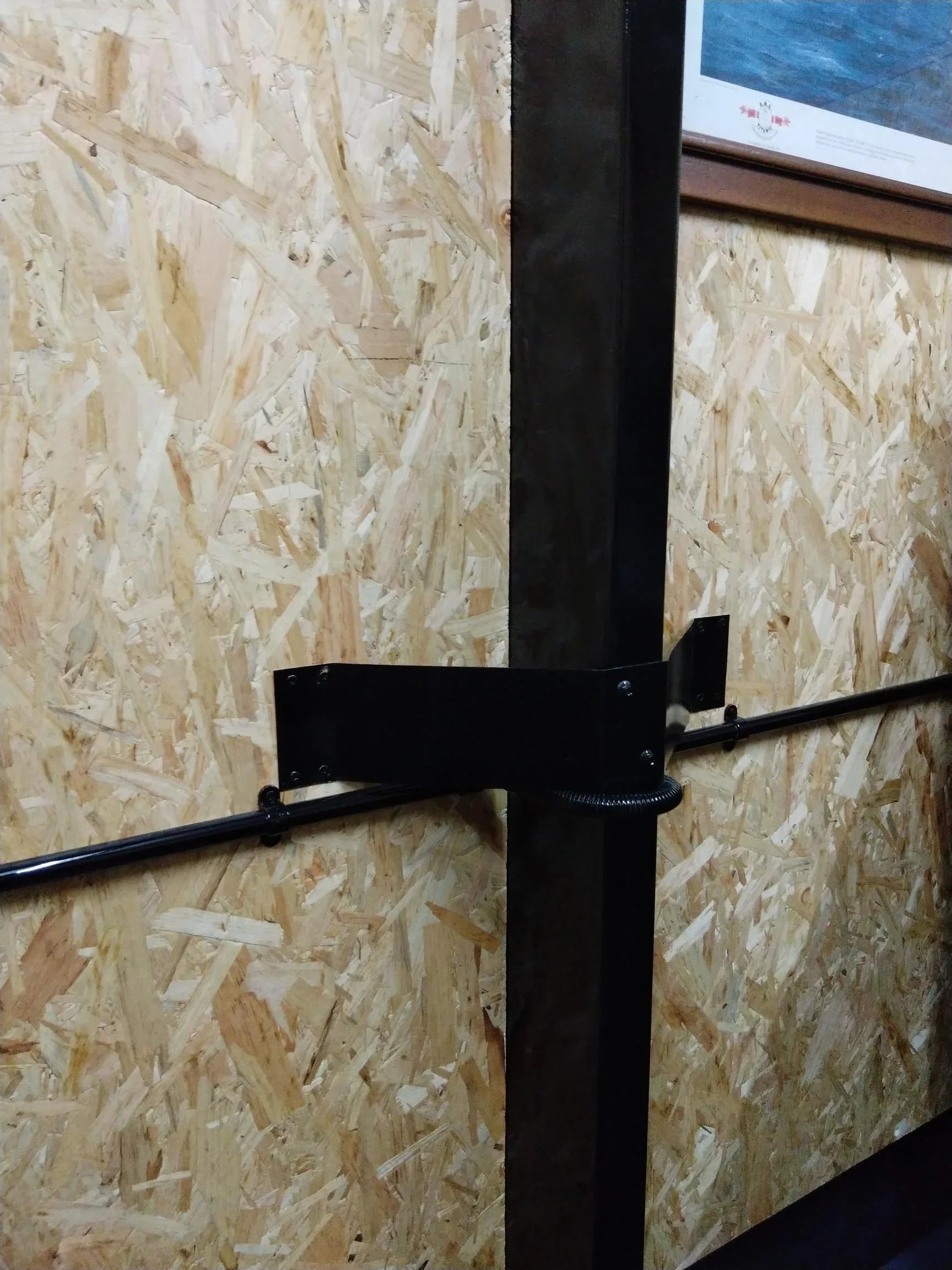 OSB panel edge showing thickness and cross-oriented strand layers
