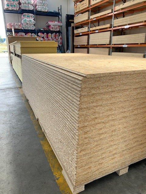 stack of osb-board-18mm-tongue-and-groove-flooring in warehouse
